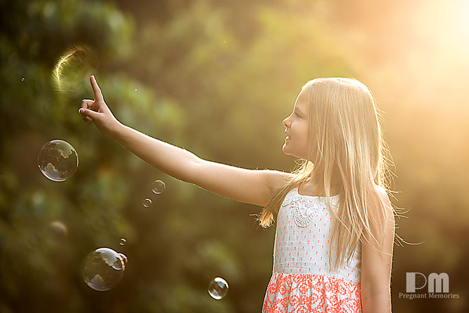 Child Photographer child popping bubbles, awards, gold coast