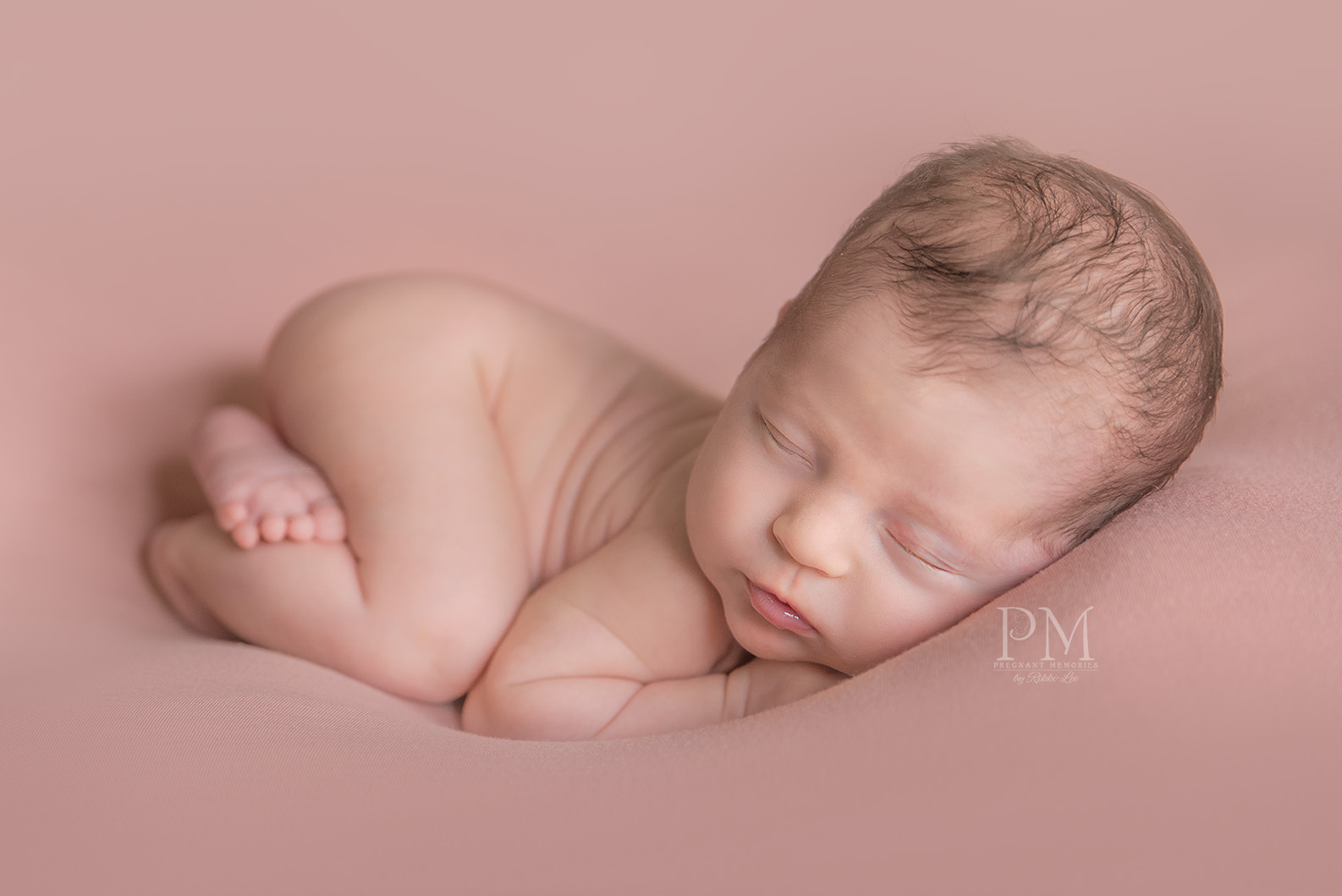 Beautiful newborn girl smiling Gold Coast Photography.
